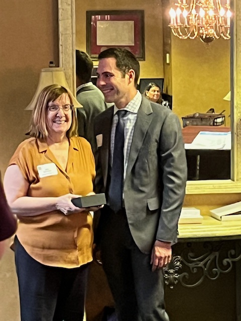 Thomas_Dennis_presenting_the_PSLS_Joined_in_Justice_award_to_Julia_Mackert.jpg